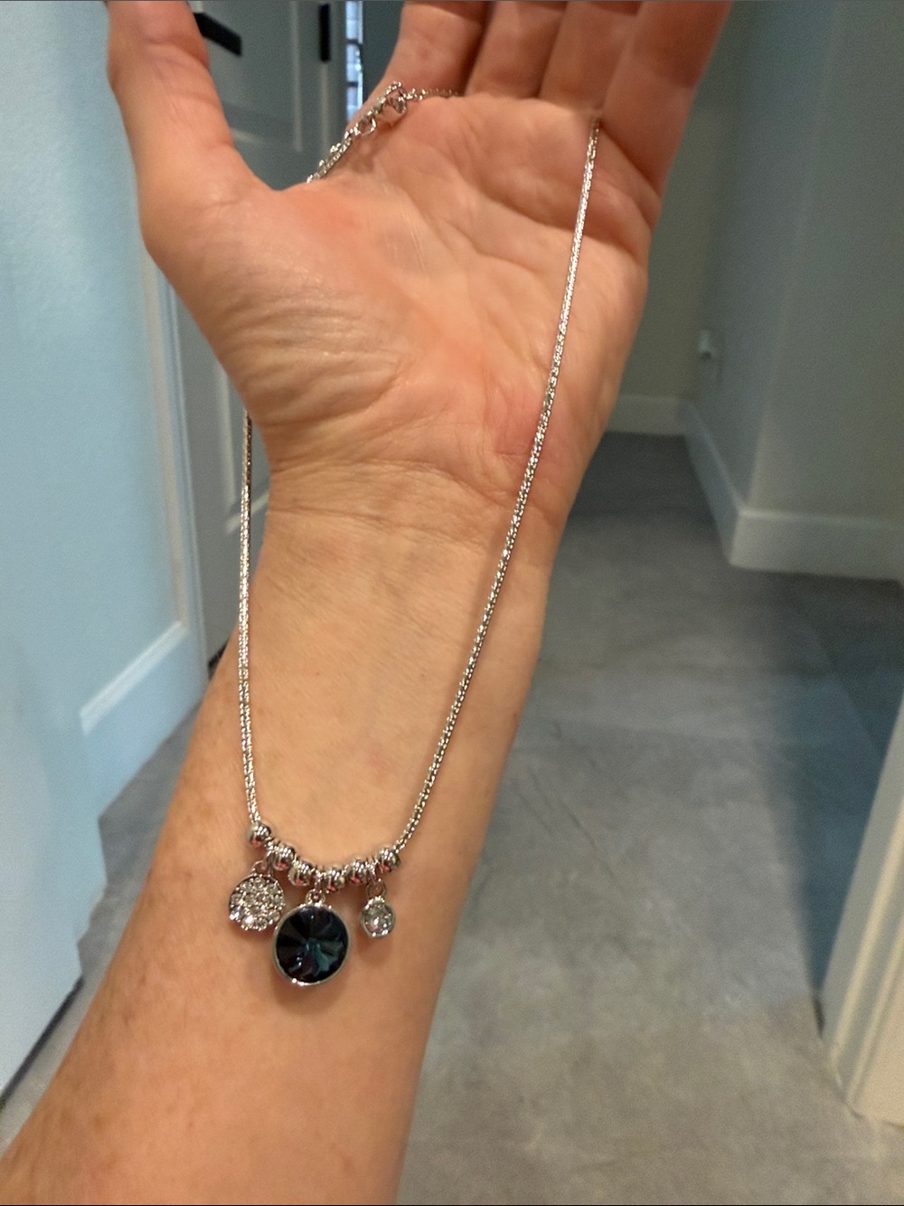 Touchstone Crystal Silver Necklace with Blue Crystal Pendant and Clear Accents